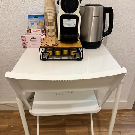 Quarto em Acomodações Particulares Sencilla En Piso Hogareno *