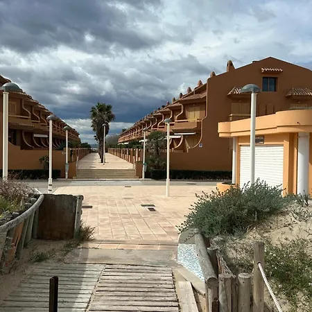 Adosado En La Playa De El Perellonet Con Piscina, Pista Tenis Hébergement de vacances *
