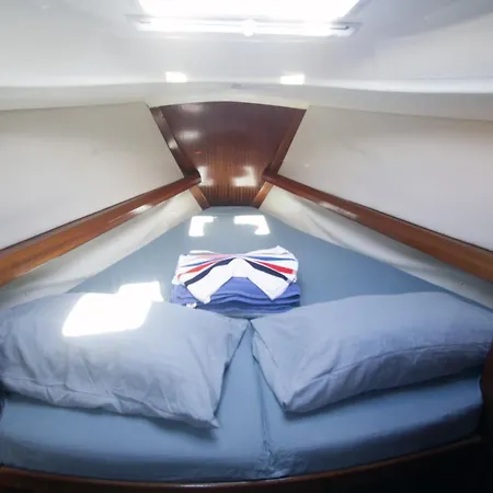 On A Sailing Boat In Ботель