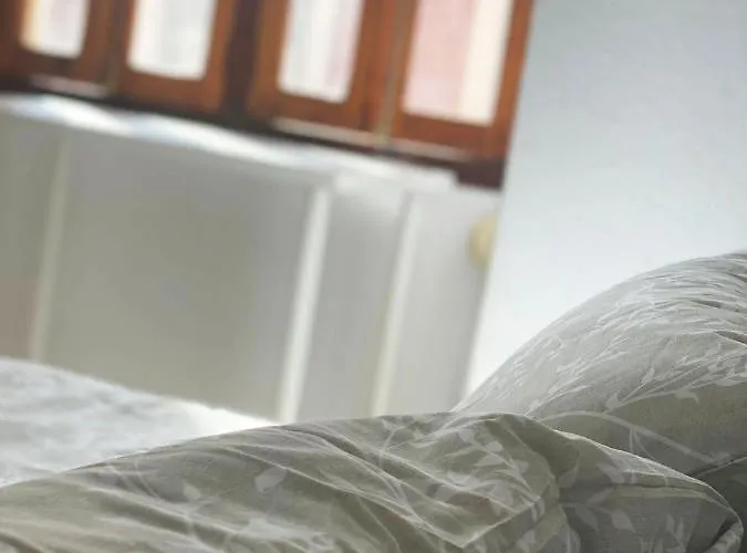 Cerca Al Puerto Shared بيت ضيافة *