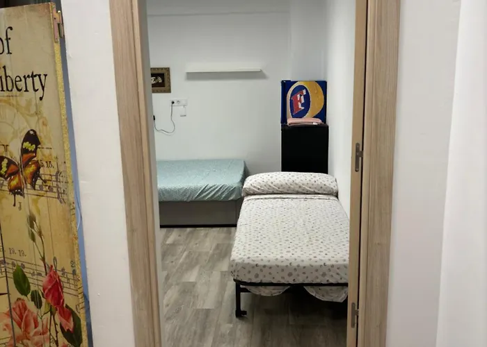 Habitacion En Playa Malvarrosa Δωμάτια σε οικογενειακή κατοικία