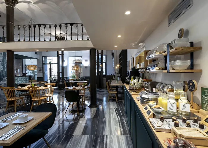 Petit Palace Plaza De La Reina Hotel 3*