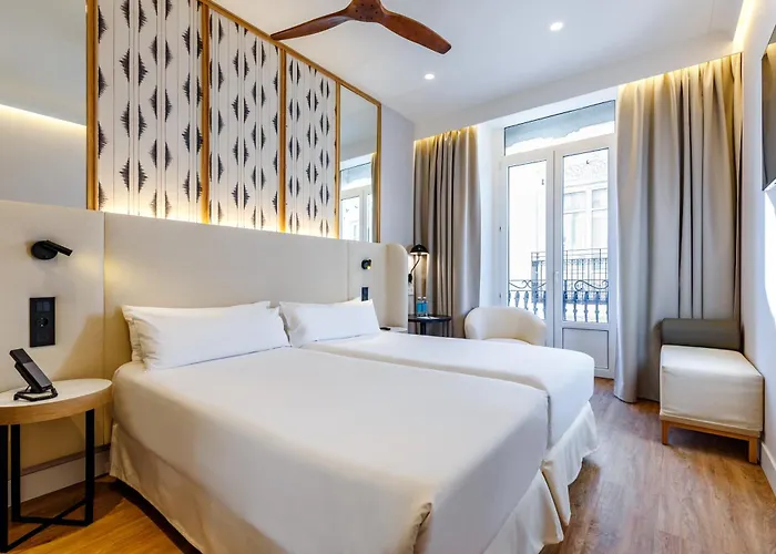 Petit Palace Plaza De La Reina Szálloda