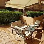 Adosado En La Playa De El Perellonet Con Piscina, Pista Tenis Hébergement de vacances *
