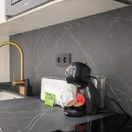 Flats-elegante, Junto Al Roig Arena