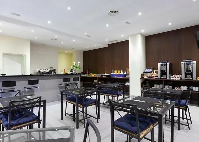 Olympia Universidades Отель