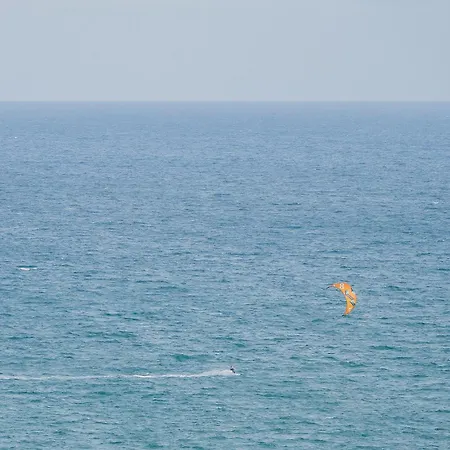 Ocean's Whisper: Les Palmeres Seaview Sanctuary Apartment *